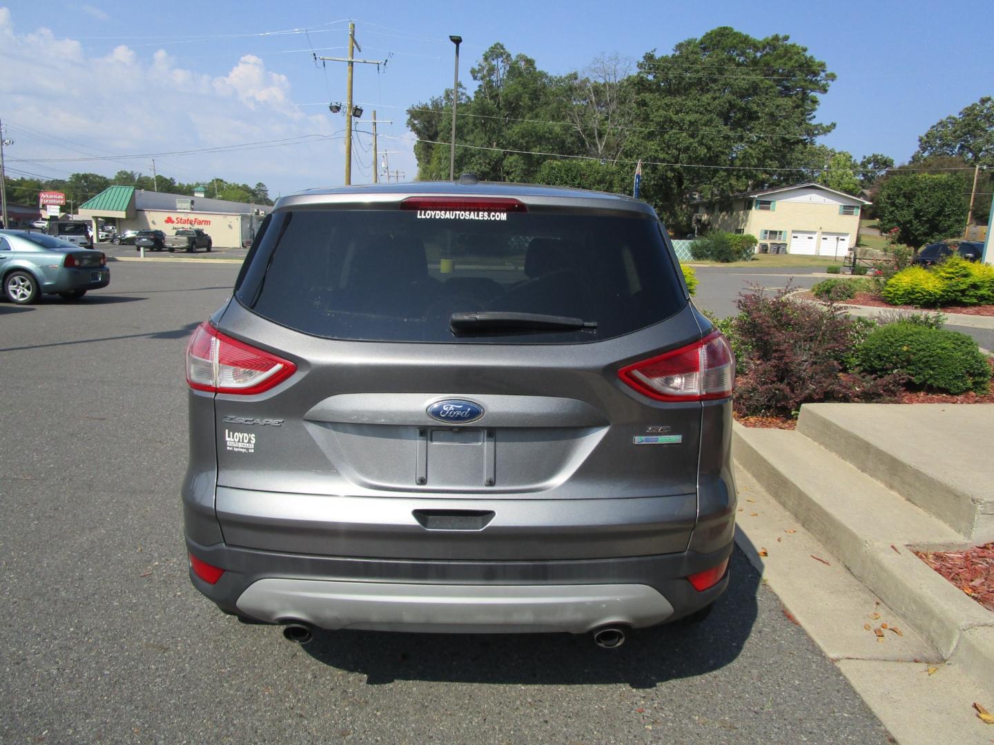 2014 Grey /Gray / Cloth Ford Escape SE FWD (1FMCU0GX6EU) with an 1.6L L4 DOHC 16V engine, 6-Speed Automatic transmission, located at 1814 Albert Pike Road, Hot Springs, AR, 71913, (501) 623-1717, 34.494228, -93.094070 - Photo#4