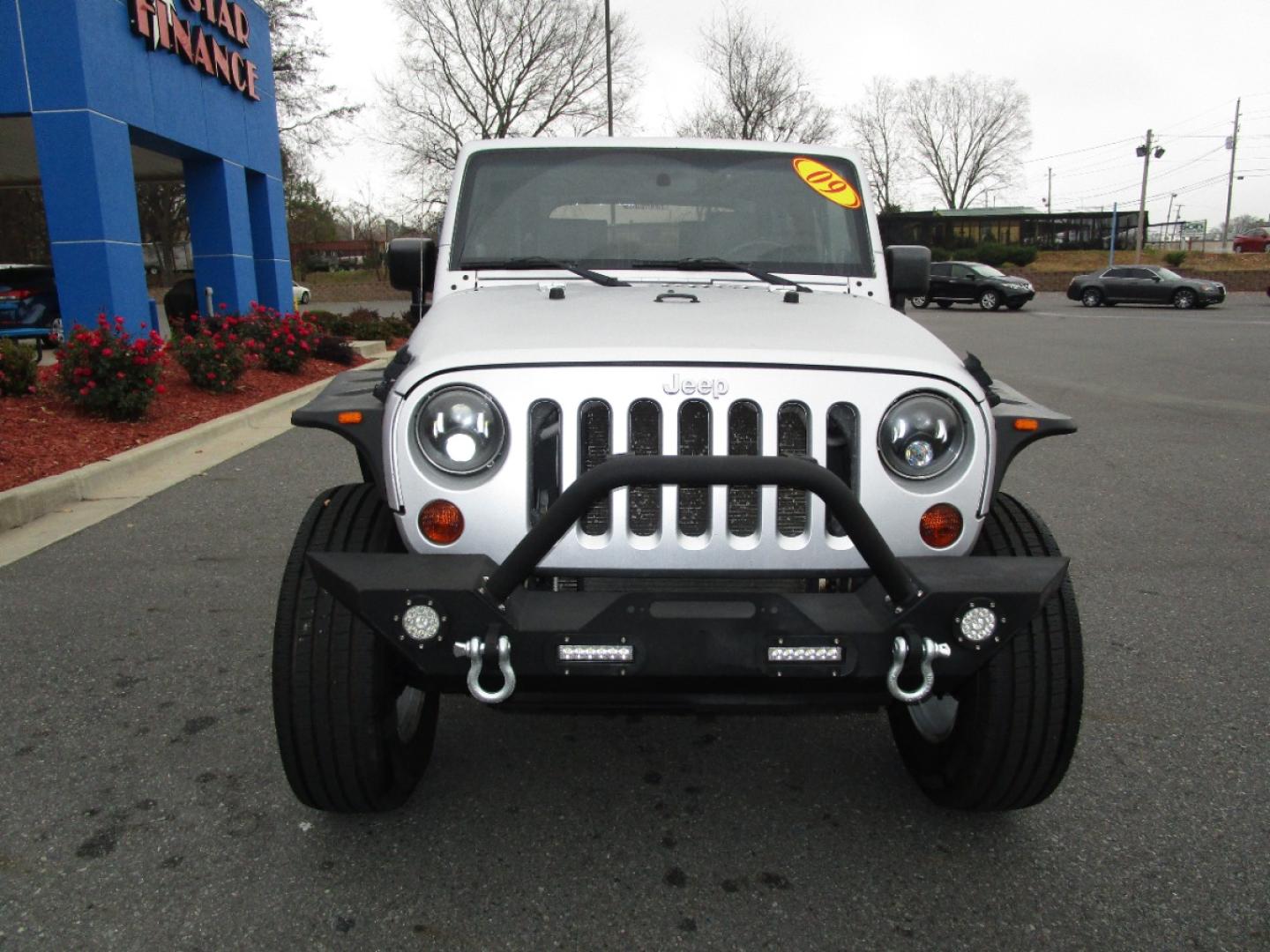 2009 SILVER /Black / Cloth Jeep Wrangler X (1J4FA24109L) with an 3.8L V6 OHV 12V engine, located at 1814 Albert Pike Road, Hot Springs, AR, 71913, (501) 623-1717, 34.494228, -93.094070 - Photo#2