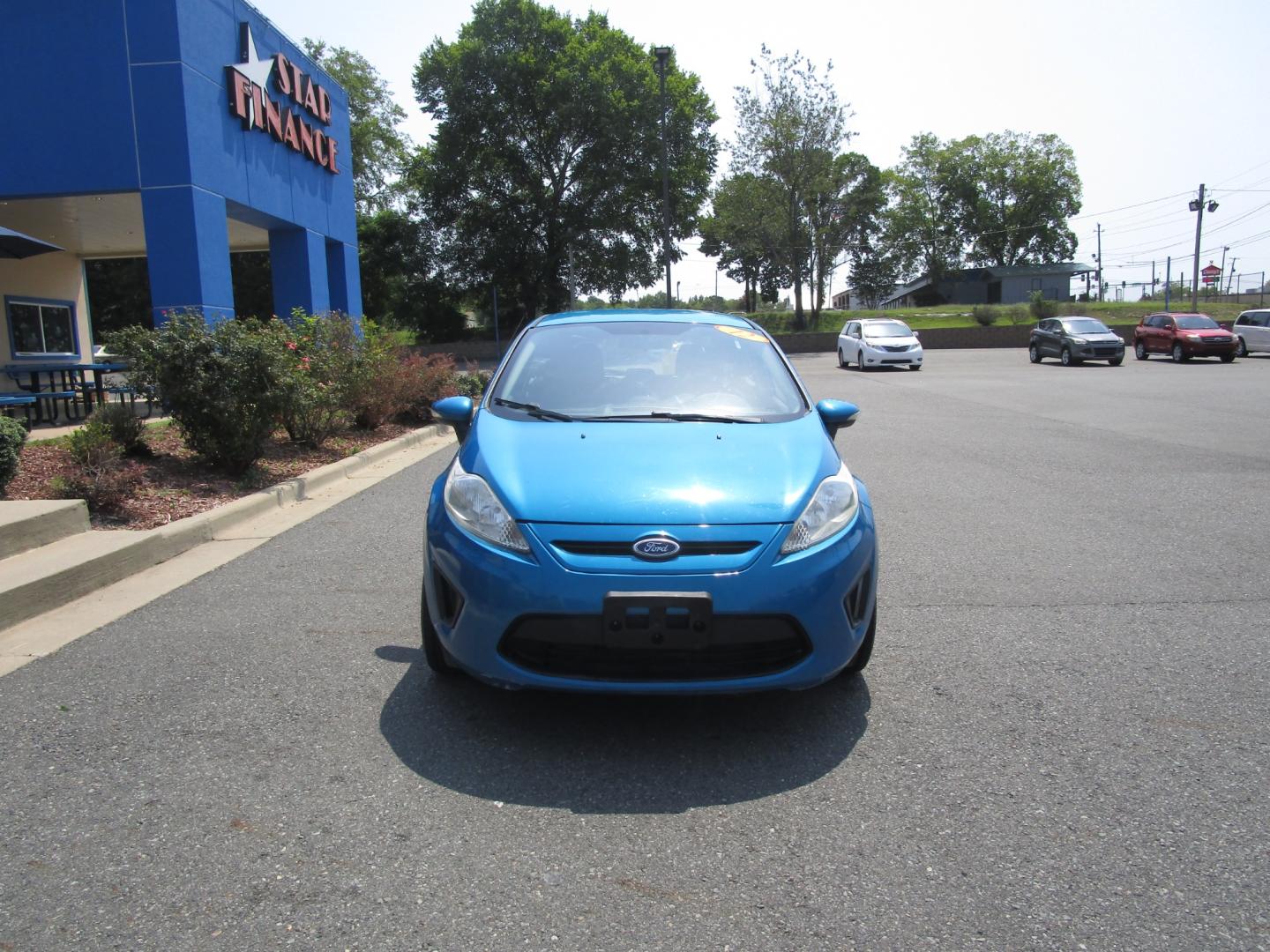 2013 Blue /Black / Cloth Ford Fiesta SE Hatchback (3FADP4EJ8DM) with an 1.6L L4 DOHC 16V engine, 5 SPEED AUTOMATIC transmission, located at 1814 Albert Pike Road, Hot Springs, AR, 71913, (501) 623-1717, 34.494228, -93.094070 - Photo#1