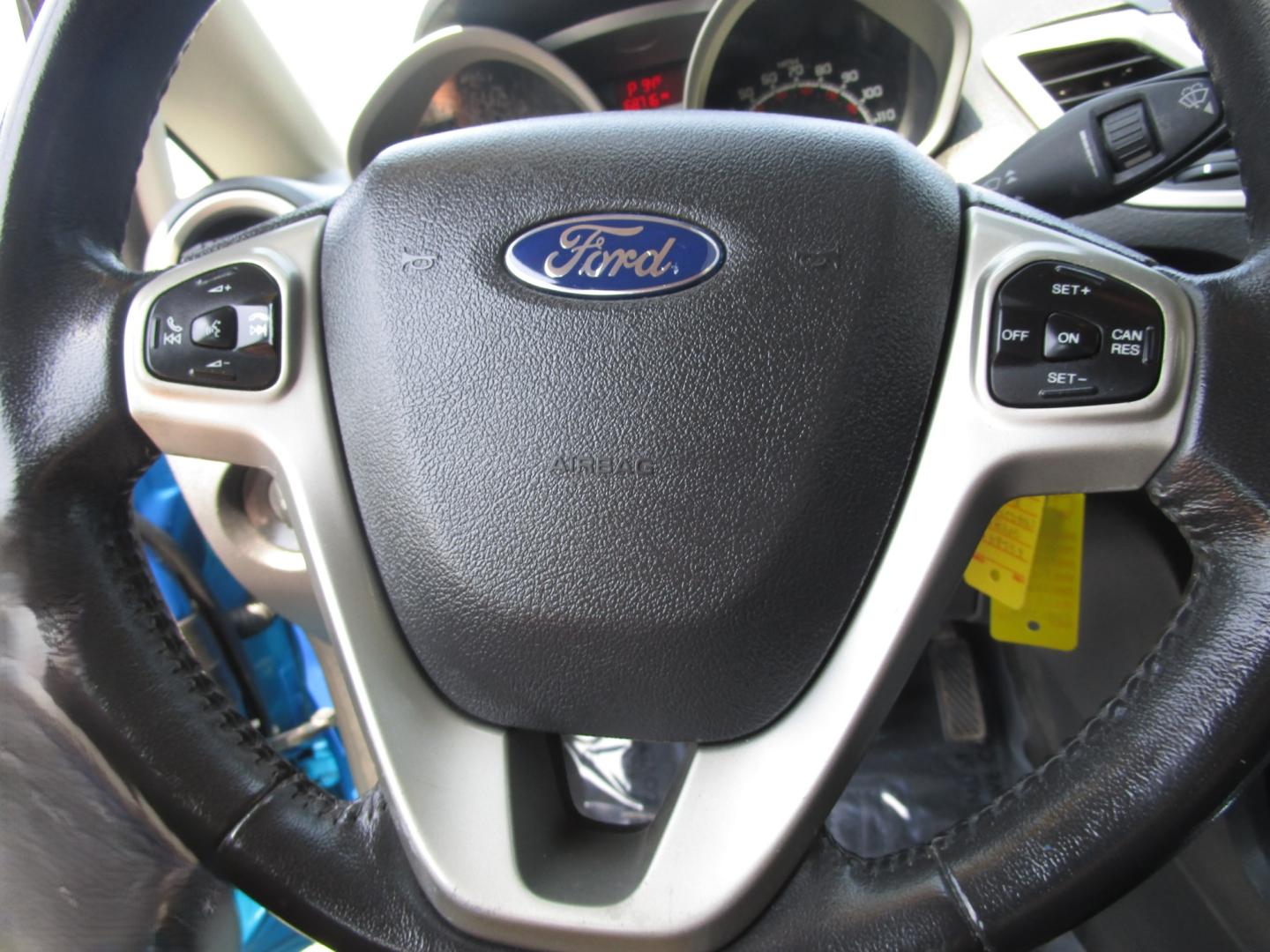 2013 Blue /Black / Cloth Ford Fiesta SE Hatchback (3FADP4EJ8DM) with an 1.6L L4 DOHC 16V engine, 5 SPEED AUTOMATIC transmission, located at 1814 Albert Pike Road, Hot Springs, AR, 71913, (501) 623-1717, 34.494228, -93.094070 - Photo#5