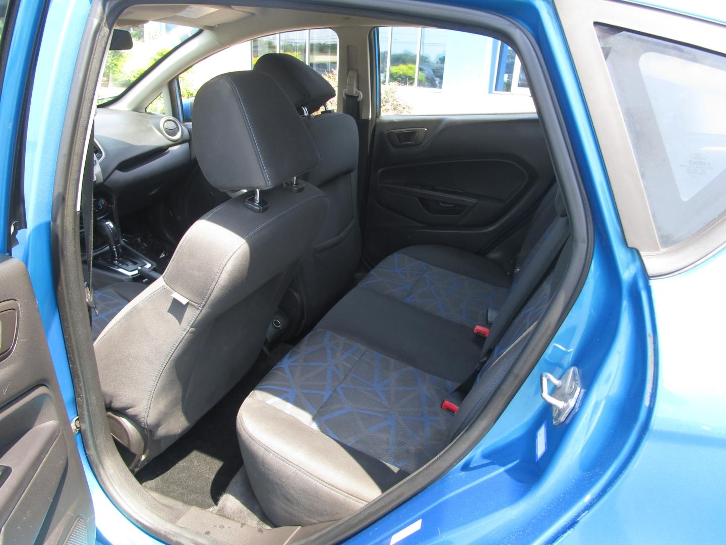 2013 Blue /Black / Cloth Ford Fiesta SE Hatchback (3FADP4EJ8DM) with an 1.6L L4 DOHC 16V engine, 5 SPEED AUTOMATIC transmission, located at 1814 Albert Pike Road, Hot Springs, AR, 71913, (501) 623-1717, 34.494228, -93.094070 - Photo#9