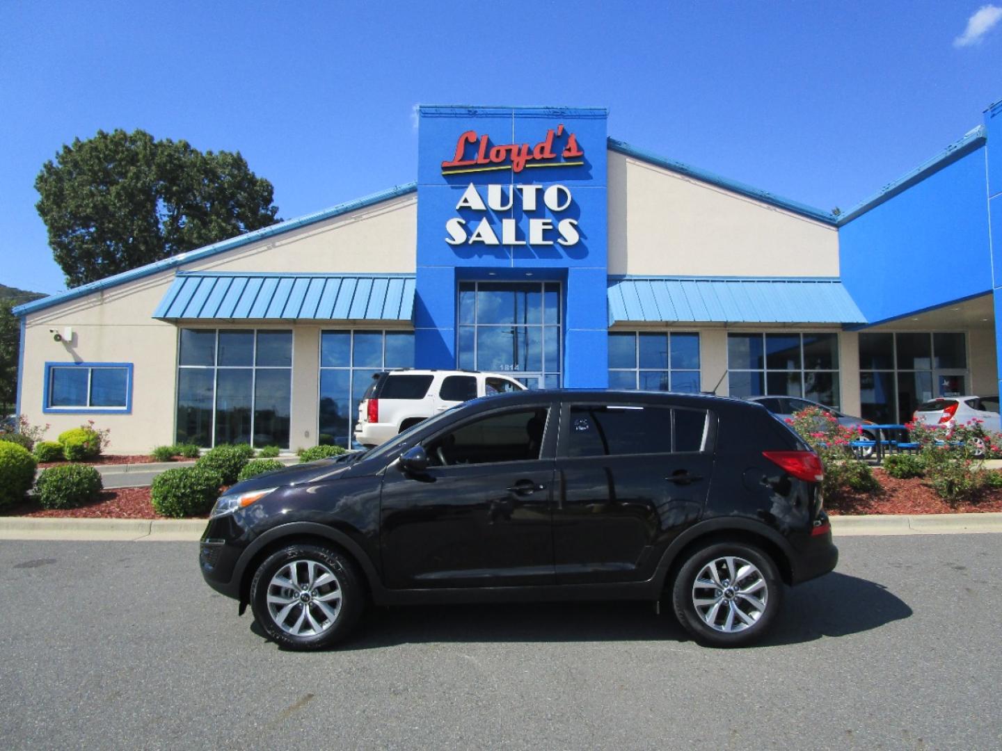 2016 BLACK /Black / Cloth Kia Sportage LX FWD (KNDPB3AC4G7) with an 2.4L V6 DOHC 24V engine, 6-Speed Automatic transmission, located at 1814 Albert Pike Road, Hot Springs, AR, 71913, (501) 623-1717, 34.494228, -93.094070 - Photo#0