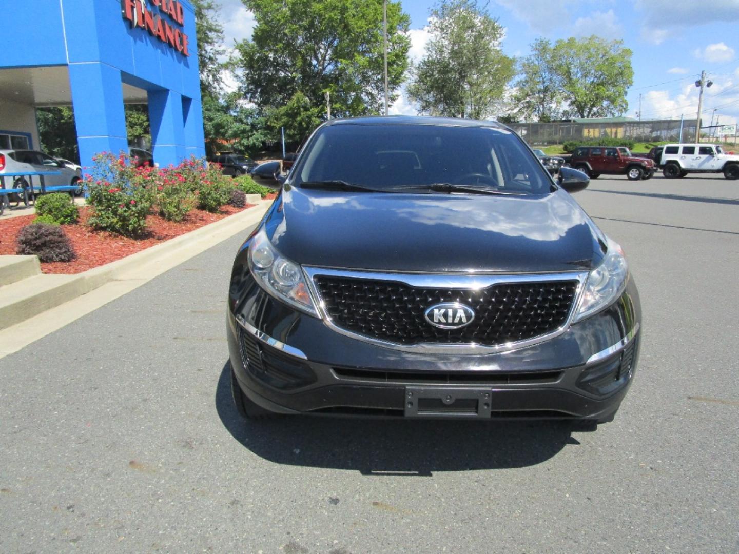 2016 BLACK /Black / Cloth Kia Sportage LX FWD (KNDPB3AC4G7) with an 2.4L V6 DOHC 24V engine, 6-Speed Automatic transmission, located at 1814 Albert Pike Road, Hot Springs, AR, 71913, (501) 623-1717, 34.494228, -93.094070 - Photo#2