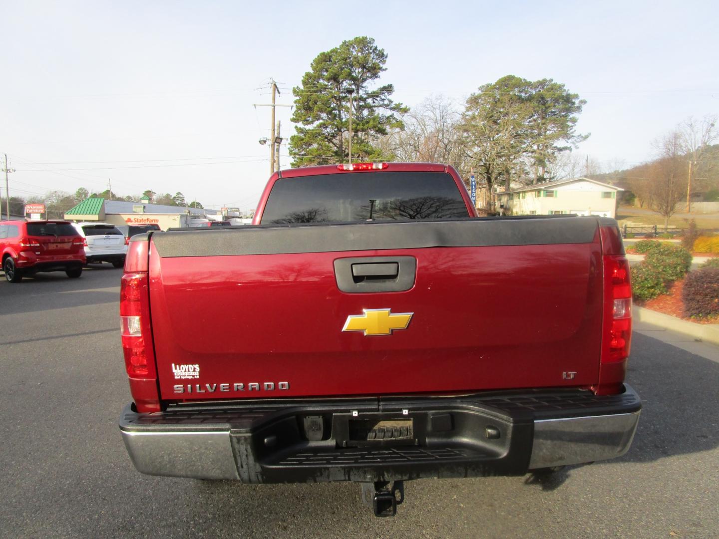 2013 MAROON /Black / Cloth Chevrolet Silverado 1500 LT Ext. Cab Long Box 2WD (1GCRCSEA4DZ) with an 4.8L V8 OHV 16V engine, 4-Speed Automatic transmission, located at 1814 Albert Pike Road, Hot Springs, AR, 71913, (501) 623-1717, 34.494228, -93.094070 - Photo#4