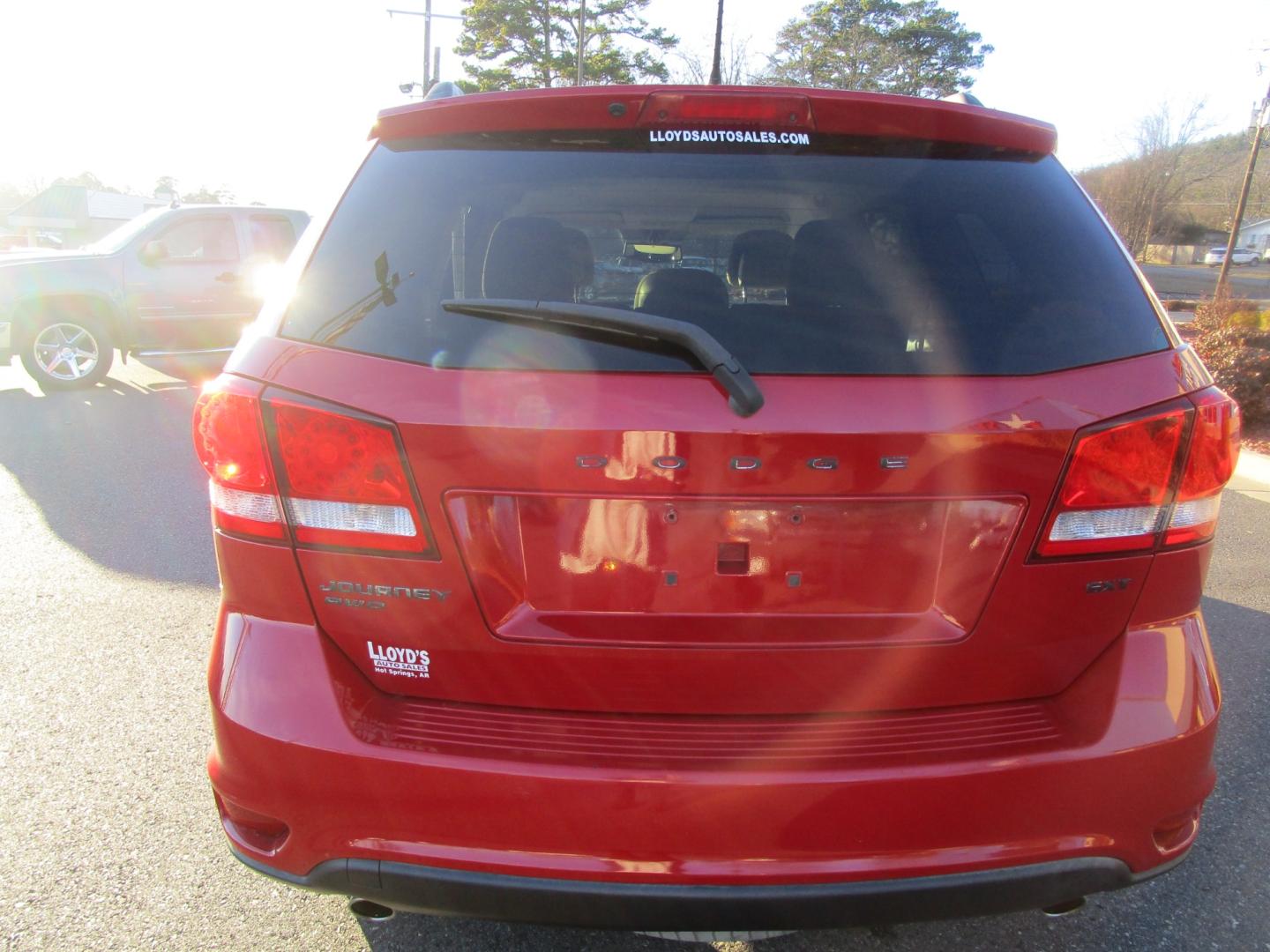 2013 RED /Black / Cloth Dodge Journey SXT AWD (3C4PDDBG1DT) with an 3.6L V6 DOHC 24V engine, 6-Speed Automatic transmission, located at 1814 Albert Pike Road, Hot Springs, AR, 71913, (501) 623-1717, 34.494228, -93.094070 - Photo#3