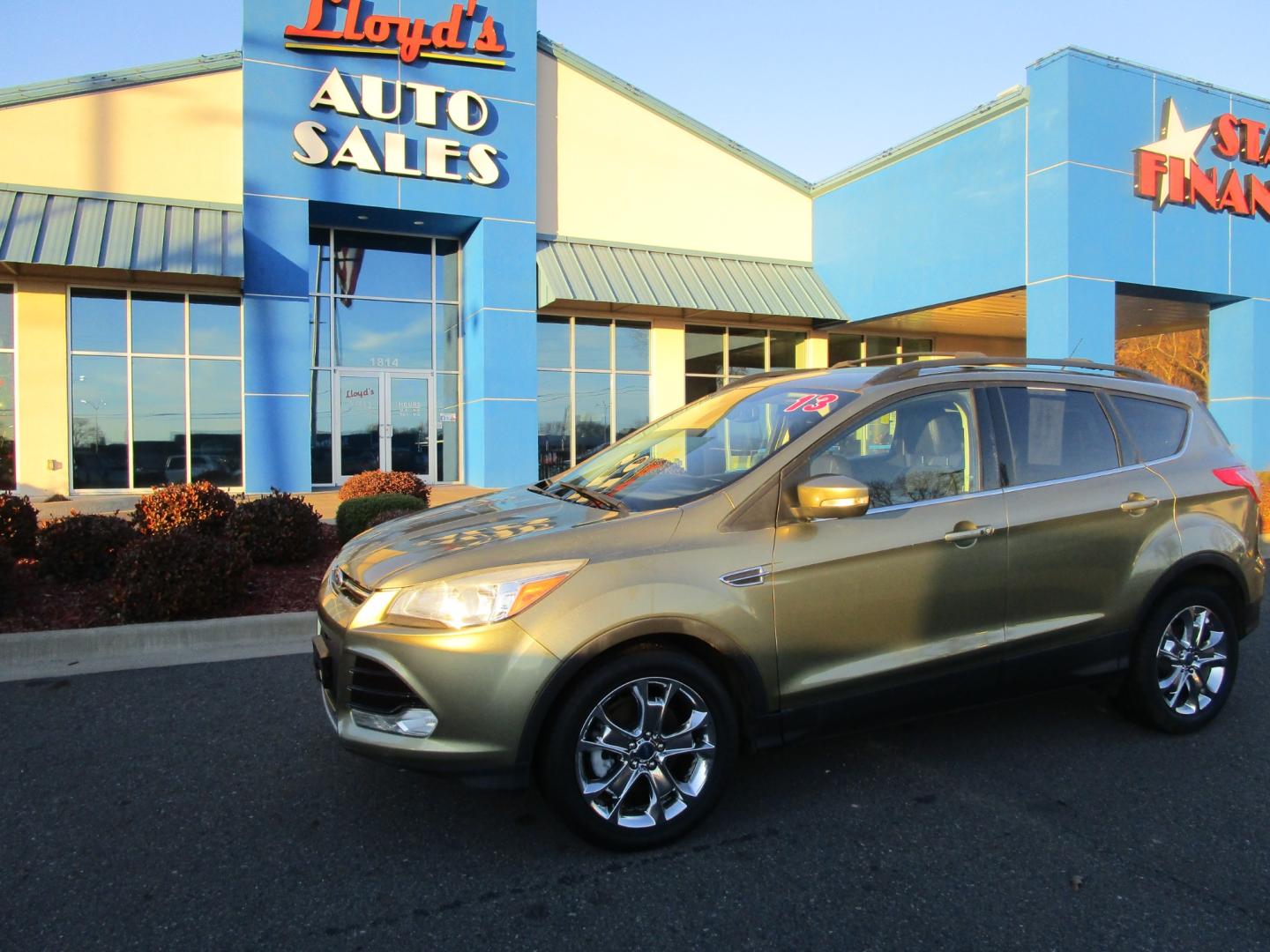 2013 Green /Black / Leather Ford Escape SEL FWD (1FMCU0HX4DU) with an 1.6L L4 DOHC 16V engine, 6-Speed Automatic transmission, located at 1814 Albert Pike Road, Hot Springs, AR, 71913, (501) 623-1717, 34.494228, -93.094070 - Photo#1