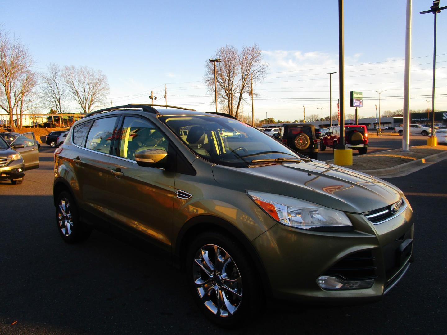 2013 Green /Black / Leather Ford Escape SEL FWD (1FMCU0HX4DU) with an 1.6L L4 DOHC 16V engine, 6-Speed Automatic transmission, located at 1814 Albert Pike Road, Hot Springs, AR, 71913, (501) 623-1717, 34.494228, -93.094070 - Photo#3