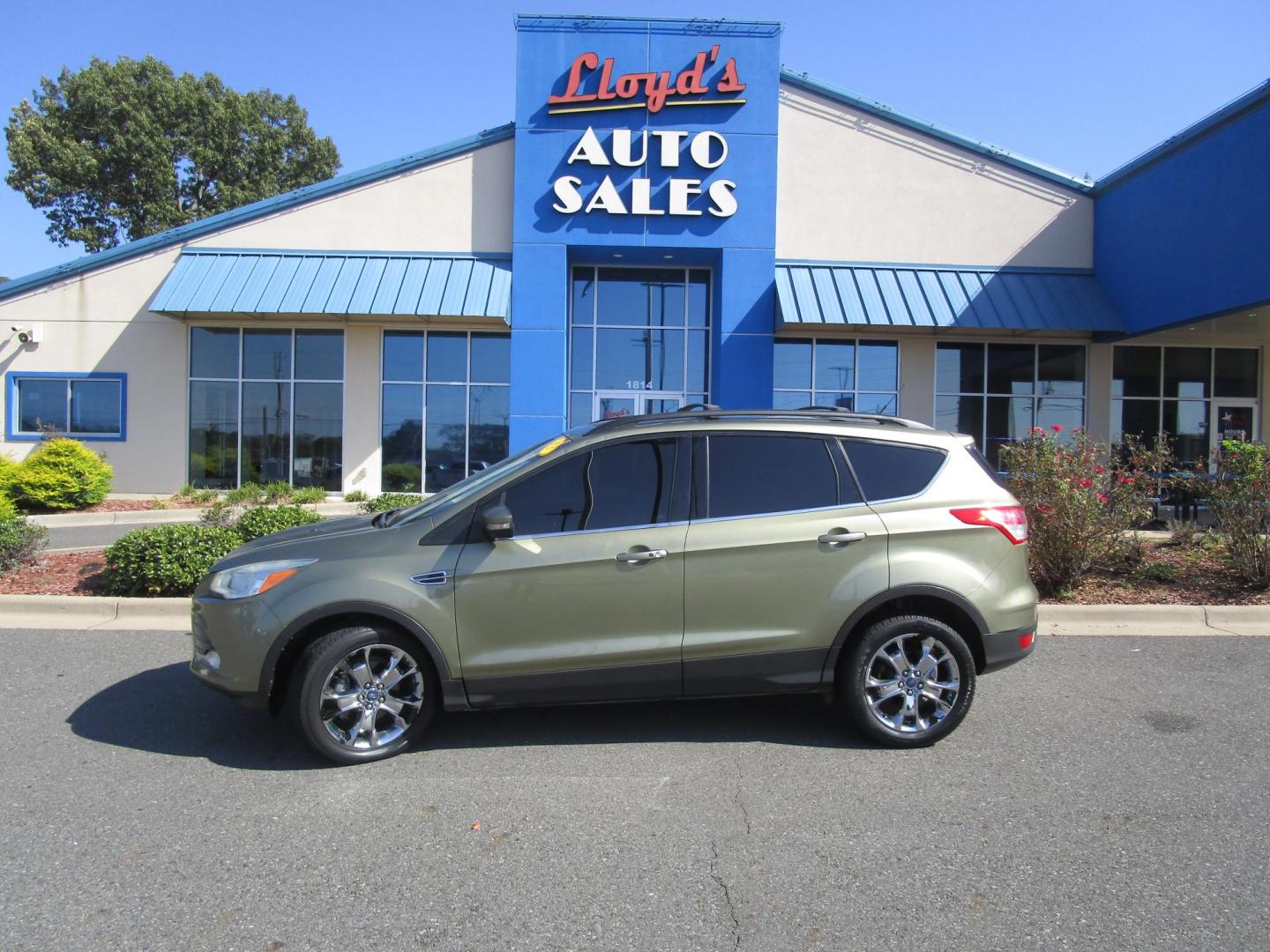 2013 Green /Black / Leather Ford Escape SEL FWD (1FMCU0HX4DU) with an 1.6L L4 DOHC 16V engine, 6-Speed Automatic transmission, located at 1814 Albert Pike Road, Hot Springs, AR, 71913, (501) 623-1717, 34.494228, -93.094070 - Photo#0