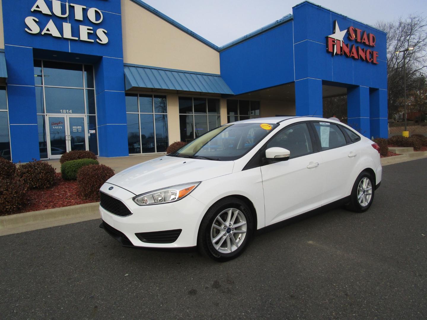 2017 WHITE /Gray / Cloth Ford Focus SE Sedan (1FADP3F28HL) with an 2.0L L4 DOHC 16V engine, located at 1814 Albert Pike Road, Hot Springs, AR, 71913, (501) 623-1717, 34.494228, -93.094070 - Photo#1