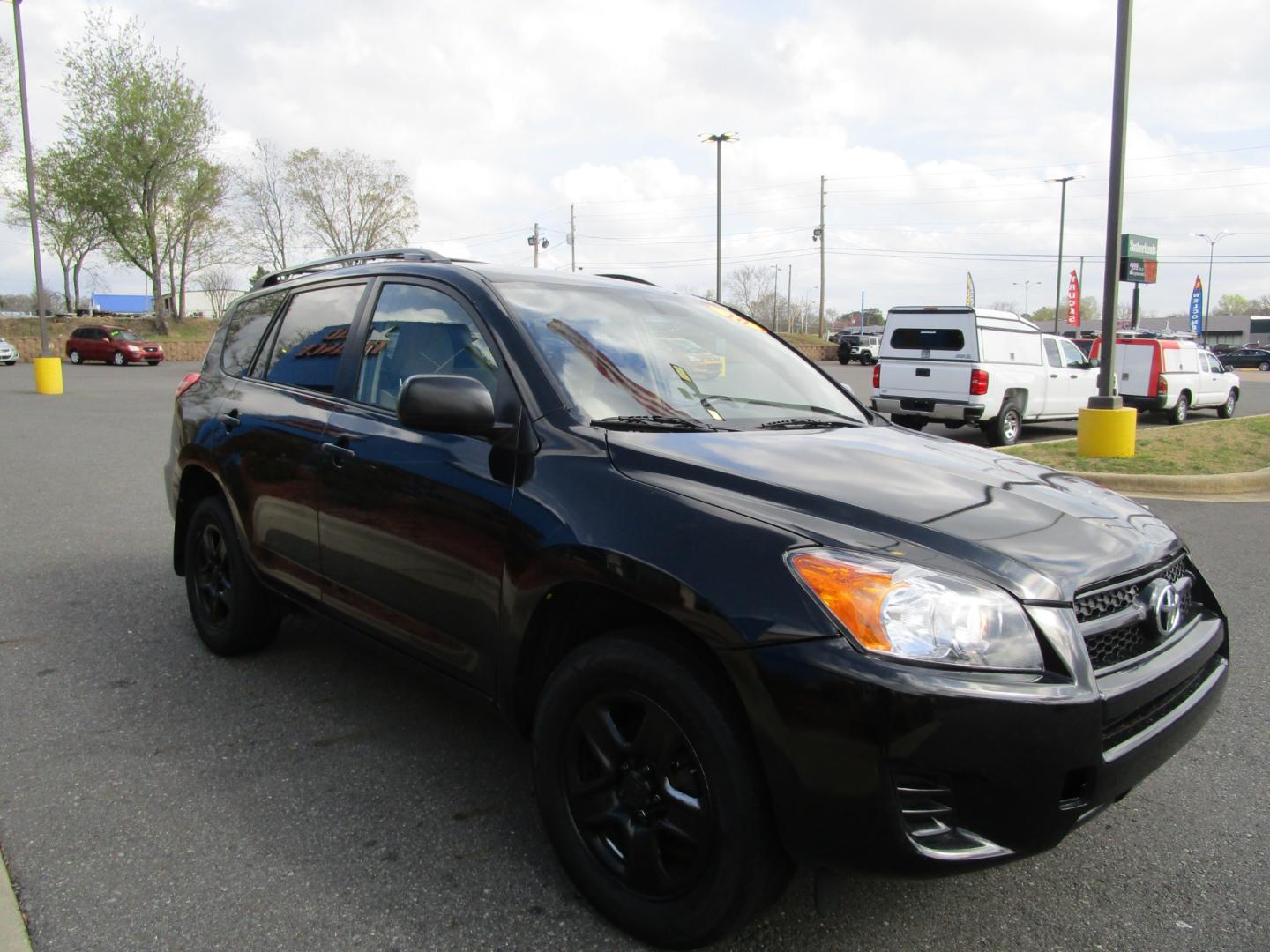 2010 BLACK /Tan / Cloth Toyota RAV4 Base I4 4WD (JTMBF4DV3AD) with an 2.4L L4 DOHC 16V engine, 4-Speed Automatic transmission, located at 1814 Albert Pike Road, Hot Springs, AR, 71913, (501) 623-1717, 34.494228, -93.094070 - Photo#3