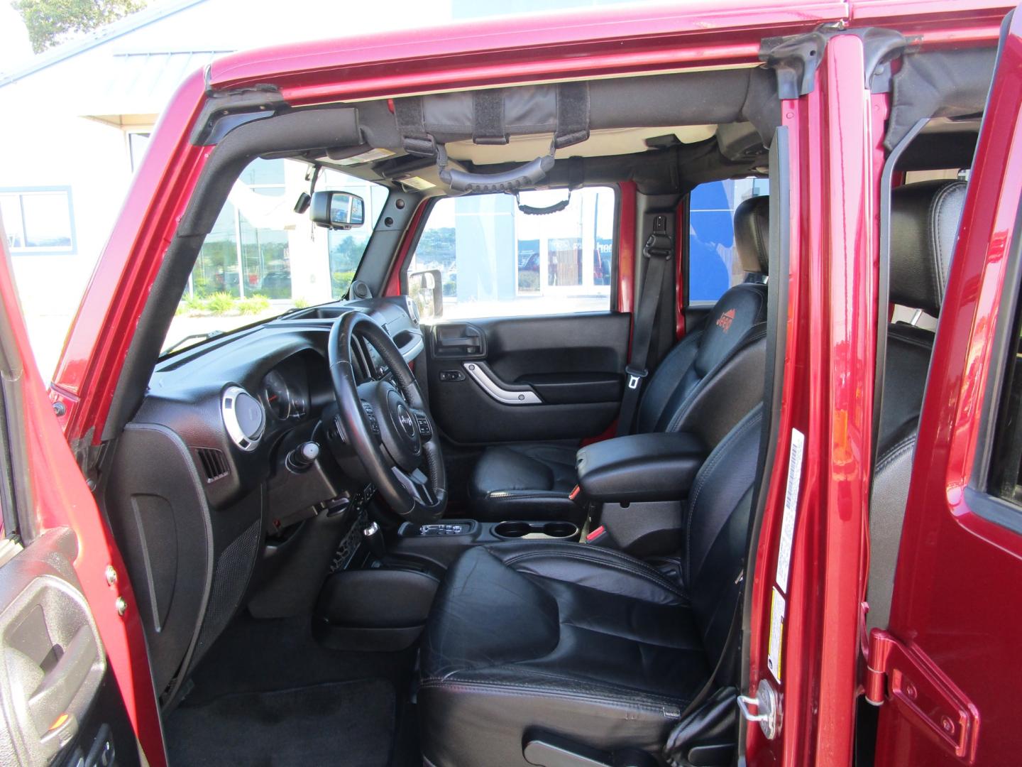 2013 MAROON Jeep Wrangler Unlimited Sahara 4WD (1C4BJWEG9DL) with an 3.6L V6 DOHC 24V FFV engine, located at 1814 Albert Pike Road, Hot Springs, AR, 71913, (501) 623-1717, 34.494228, -93.094070 - Photo#2