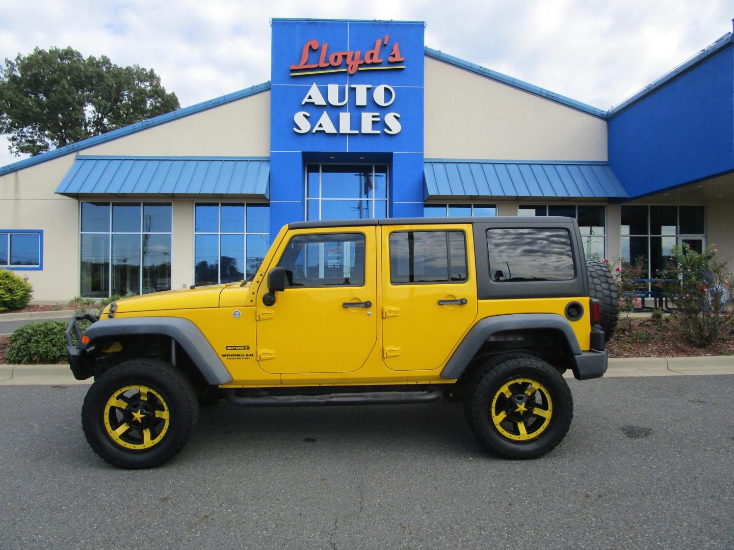 2015 Yellow /YELLOW/BLACK Jeep Wrangler Unlimited Sport 4WD (1C4BJWDG8FL) with an 3.6L V6 DOHC 24V FFV engine, located at 1814 Albert Pike Road, Hot Springs, AR, 71913, (501) 623-1717, 34.494228, -93.094070 - 4X4 JEEP - Photo#0