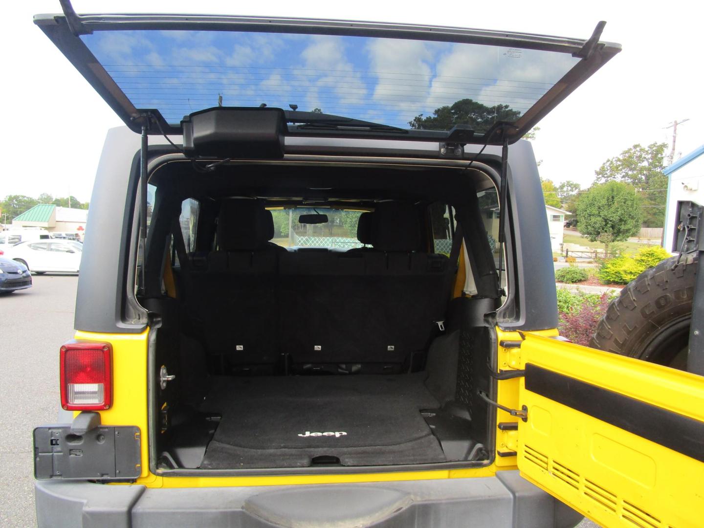 2015 Yellow /YELLOW/BLACK Jeep Wrangler Unlimited Sport 4WD (1C4BJWDG8FL) with an 3.6L V6 DOHC 24V FFV engine, located at 1814 Albert Pike Road, Hot Springs, AR, 71913, (501) 623-1717, 34.494228, -93.094070 - 4X4 JEEP - Photo#11