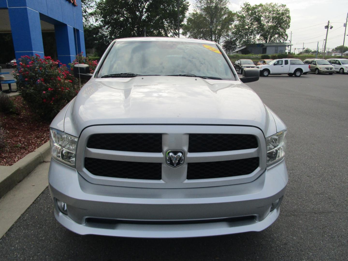 2014 SILVER /Gray / Cloth RAM 1500 Tradesman Quad Cab 2WD (1C6RR6FG9ES) with an 3.6L V6 DOHC 24V FFV engine, 6-Speed Automatic transmission, located at 1814 Albert Pike Road, Hot Springs, AR, 71913, (501) 623-1717, 34.494228, -93.094070 - LESS THAN 100,000 MILES! 3.6L V6. EXTENDED CAB. - Photo#1