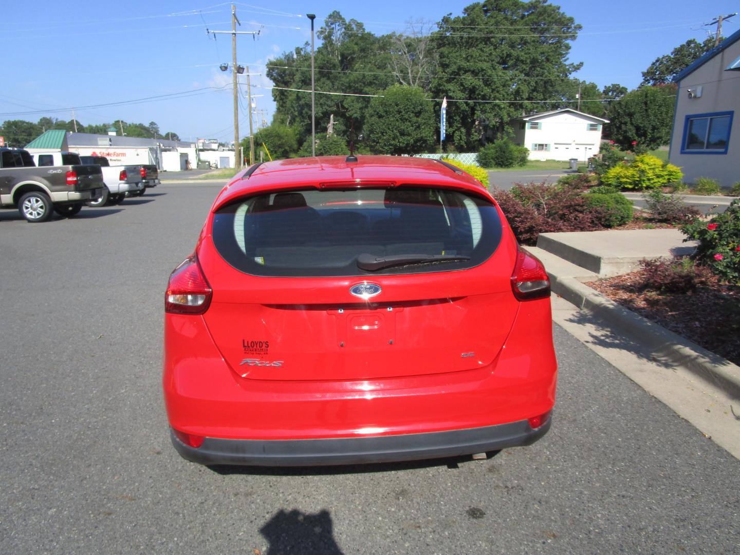 2017 RED Ford Focus SE Hatch (1FADP3K25HL) with an 2.0L L4 DOHC 16V engine, located at 1814 Albert Pike Road, Hot Springs, AR, 71913, (501) 623-1717, 34.494228, -93.094070 - Photo#2