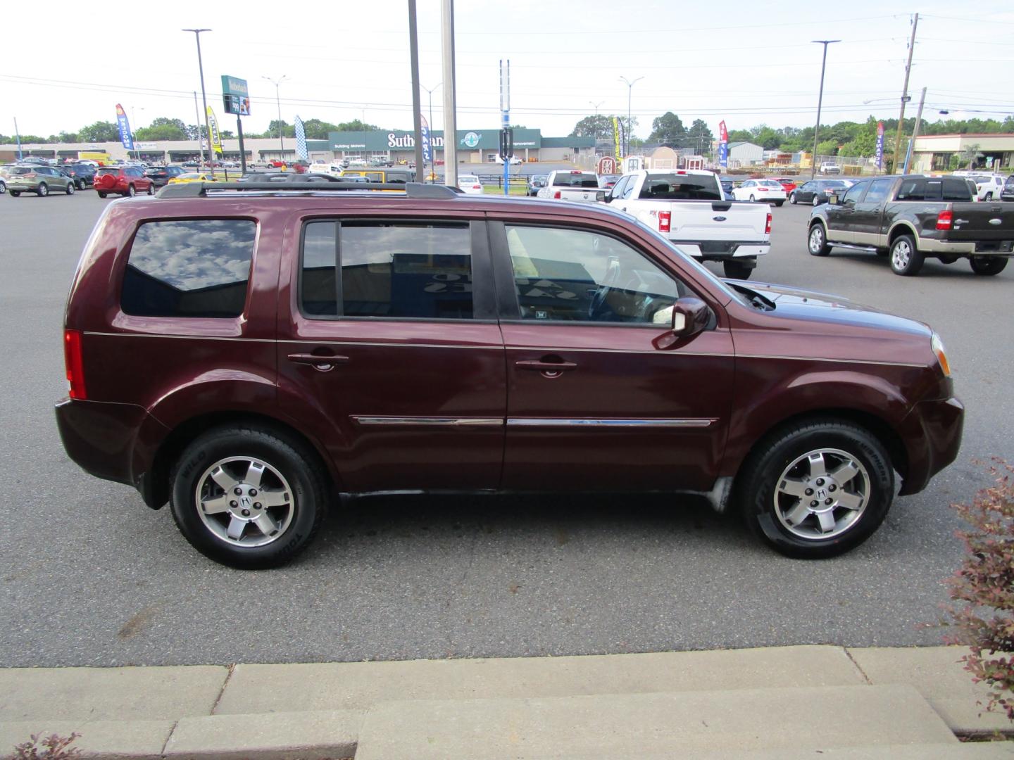 2011 MAROON Honda Pilot Touring 2WD 5-Spd AT with DVD (5FNYF3H96BB) with an 3.5L V6 SOHC 24V engine, 5-Speed Automatic transmission, located at 1814 Albert Pike Road, Hot Springs, AR, 71913, (501) 623-1717, 34.494228, -93.094070 - 2011 Honda Pilot Touring 4 Door SUV 3.5L V6 F SOHC 24V Gasoline Front Wheel Drive. 3rd Row Seating. - Photo#3