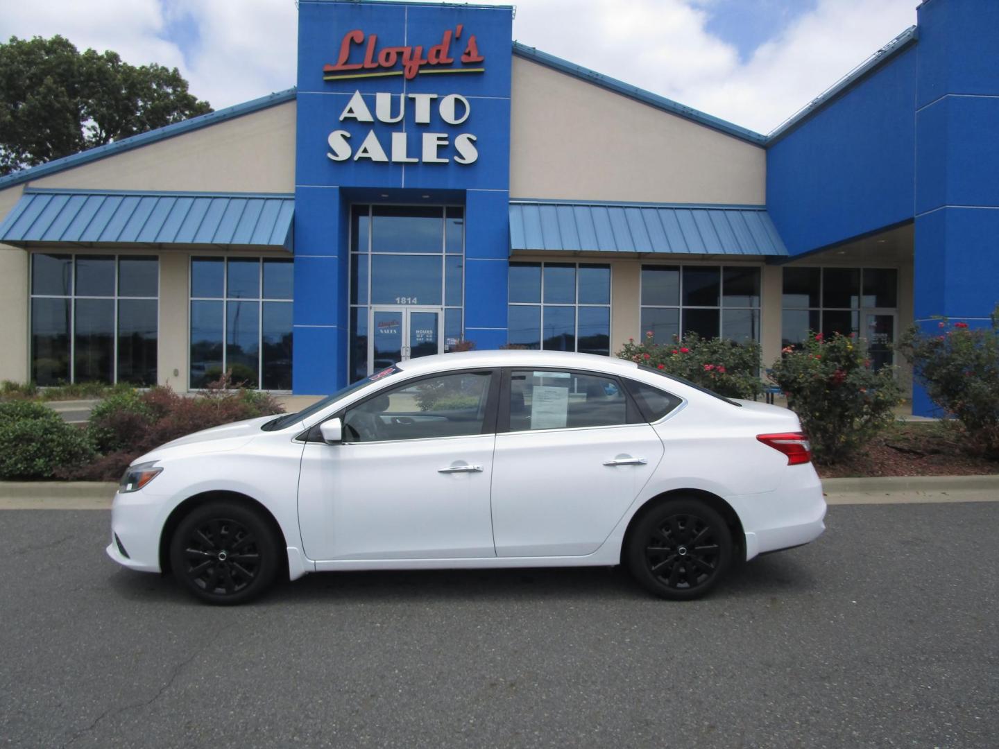 2019 WHITE /BLACK Nissan Sentra S CVT (3N1AB7AP3KY) with an 1.8L L4 SFI DOHC 16V engine, CVT transmission, located at 1814 Albert Pike Road, Hot Springs, AR, 71913, (501) 623-1717, 34.494228, -93.094070 - Mechanical & Performance Features: 1.8L DOHC 4-cylinder Engine. 6 Speed Manual transmission. Eco mode. Front and rear stabilizer bars. power-assisted vented front disc / rear drum brakes. Safety & Security Features: Lower anchors & tethers for children (Latch). Anti-lock braking system. Traction - Photo#0