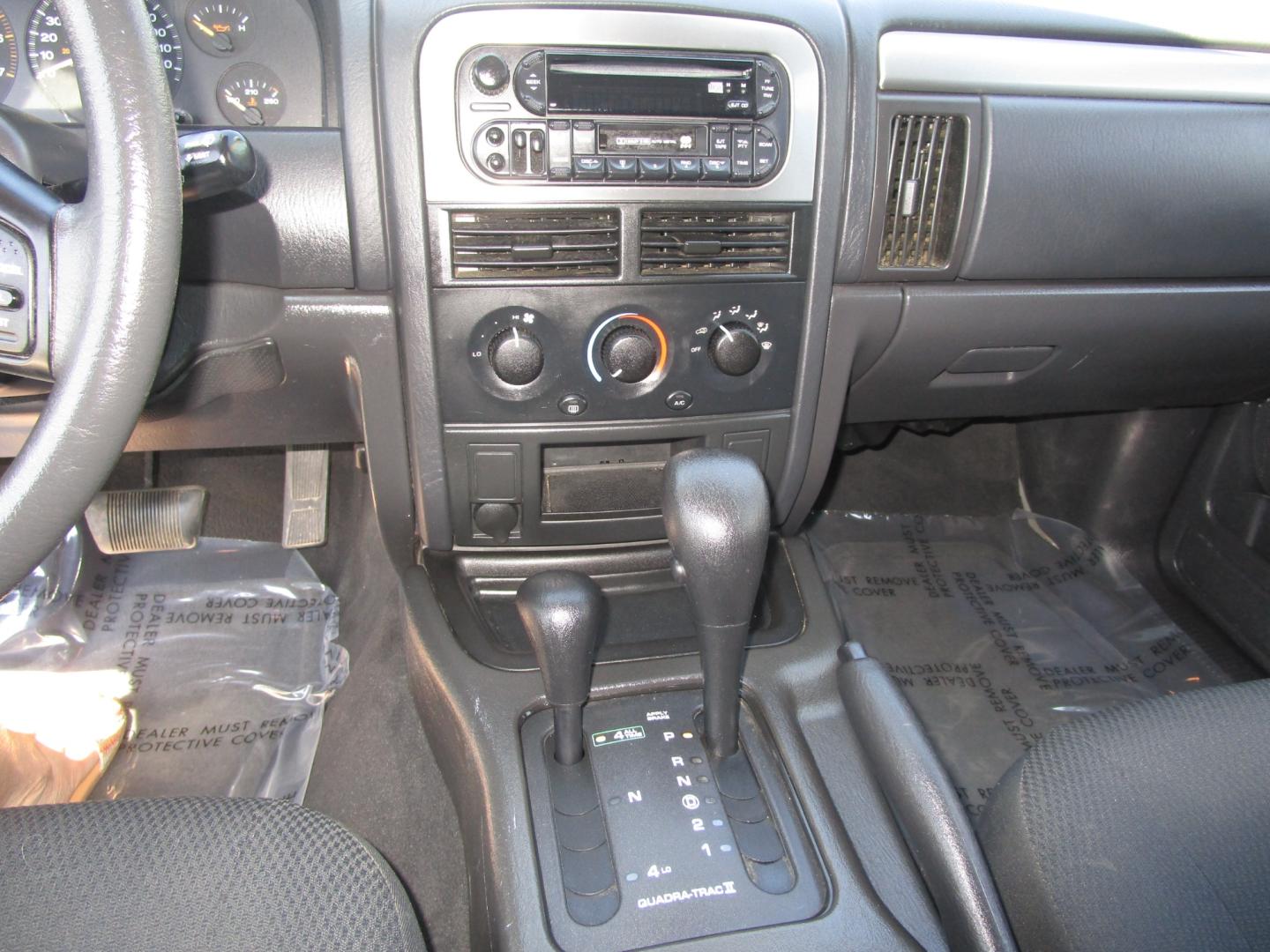 2004 SILVER /Black/Cloth Jeep Grand Cherokee Columbia Edition 4WD (1J4GW48SX4C) with an 4.0L L6 OHV 12V engine, located at 1814 Albert Pike Road, Hot Springs, AR, 71913, (501) 623-1717, 34.494228, -93.094070 - Photo#5