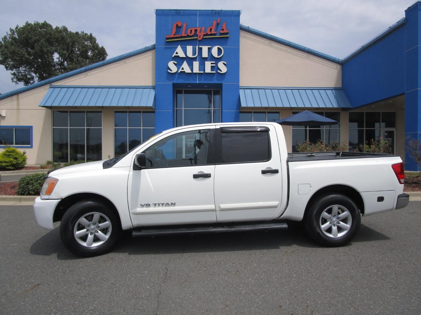 2011 WHITE /Black / Leather Nissan Titan (1N6BA0ED0BN) , located at 1814 Albert Pike Road, Hot Springs, AR, 71913, (501) 623-1717, 34.494228, -93.094070 - Photo#0