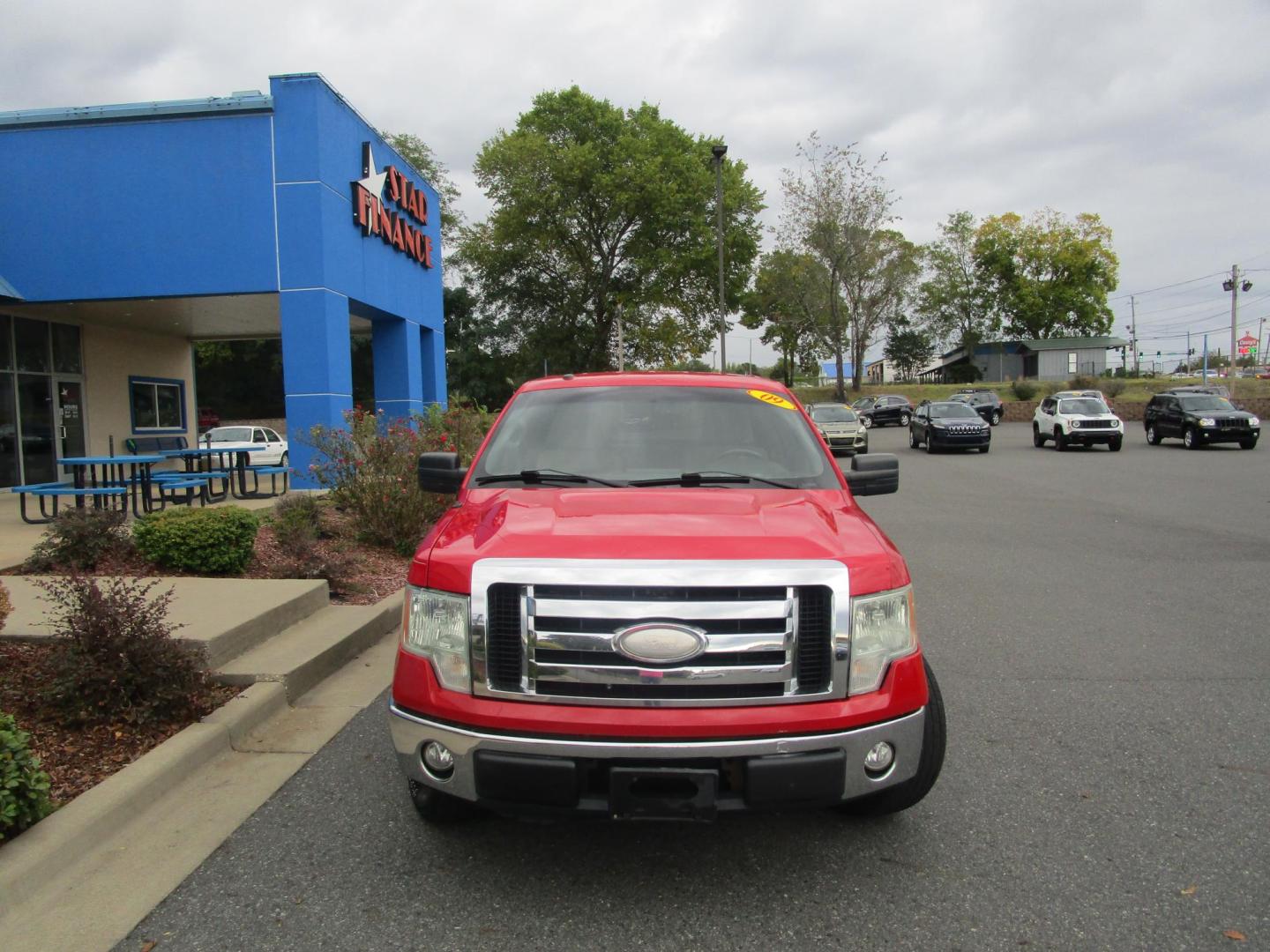 2009 RED /Tan / Cloth Ford F-150 Lariat SuperCab 5.5-ft. Bed 2WD (1FTRX12899K) , 4-Speed Automatic transmission, located at 1814 Albert Pike Road, Hot Springs, AR, 71913, (501) 623-1717, 34.494228, -93.094070 - Photo#1