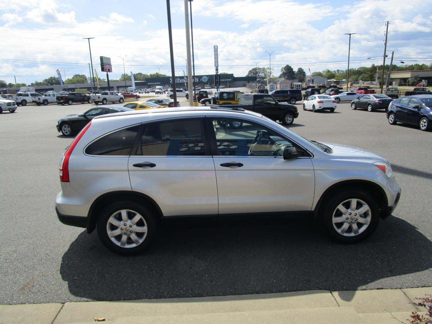 2009 SILVER /Black/Cloth Honda CR-V EX 4WD 5-Speed AT (3CZRE48519G) with an 2.4L L4 DOHC 16V engine, 5-Speed Automatic transmission, located at 1814 Albert Pike Road, Hot Springs, AR, 71913, (501) 623-1717, 34.494228, -93.094070 - Photo#2