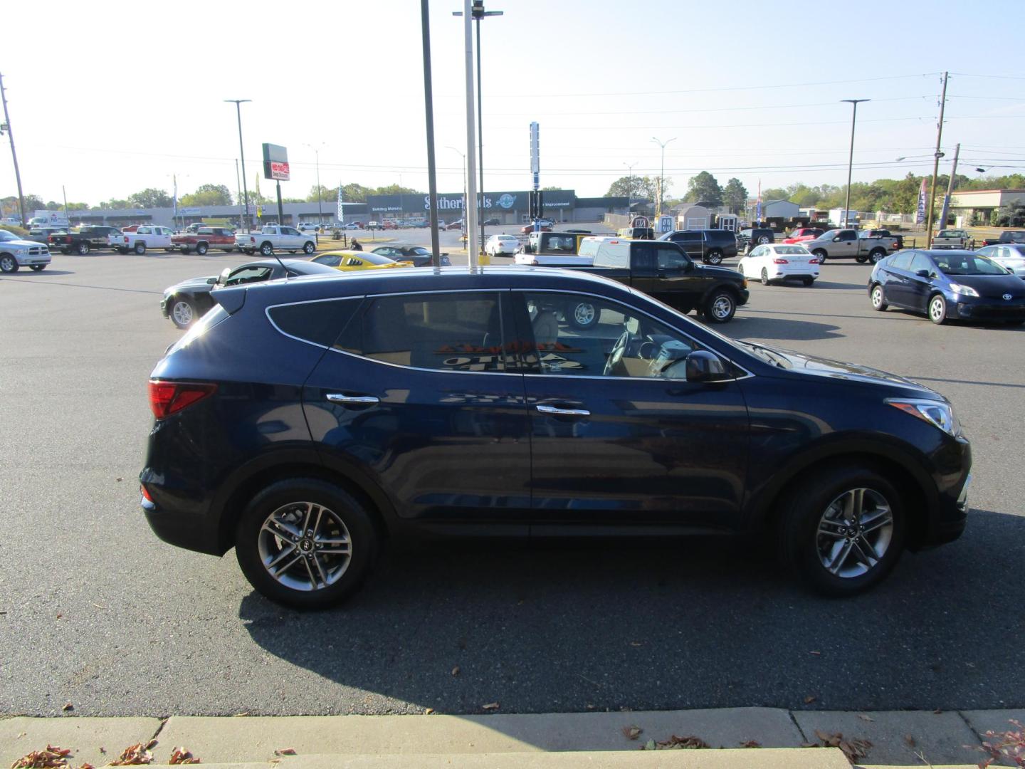 2018 Blue /TAN Hyundai Santa Fe Sport 2.4 FWD (5XYZT3LB6JG) with an 2.4L L4 DOHC 16V engine, 6A transmission, located at 1814 Albert Pike Road, Hot Springs, AR, 71913, (501) 623-1717, 34.494228, -93.094070 - Photo#2