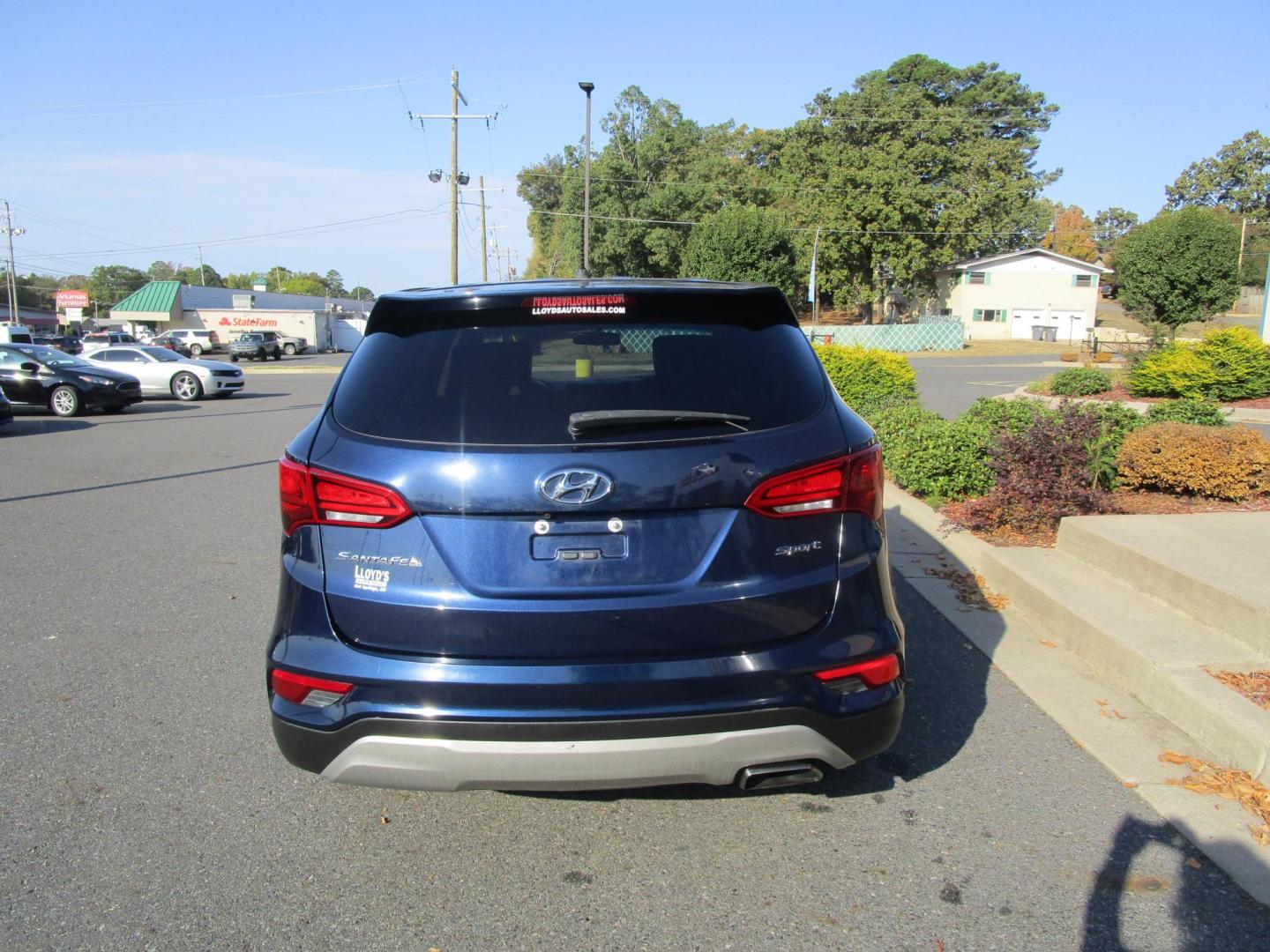 2018 Blue /TAN Hyundai Santa Fe Sport 2.4 FWD (5XYZT3LB6JG) with an 2.4L L4 DOHC 16V engine, 6A transmission, located at 1814 Albert Pike Road, Hot Springs, AR, 71913, (501) 623-1717, 34.494228, -93.094070 - Photo#3