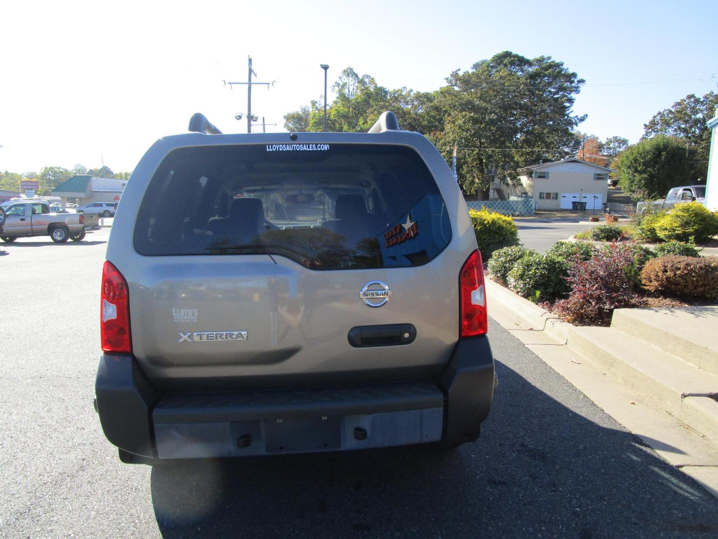 2006 GOLD Nissan Xterra OR 2WD (5N1AN08U06C) with an 4.0L V6 DOHC 24V engine, located at 1814 Albert Pike Road, Hot Springs, AR, 71913, (501) 623-1717, 34.494228, -93.094070 - ONE OWNER LOW MILES - Photo#3