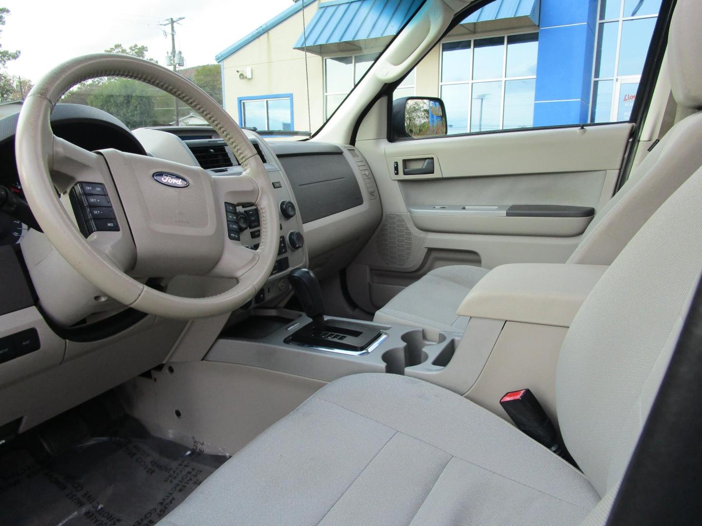 2010 Grey /Gray / Cloth Ford Escape XLT 4WD (1FMCU9D71AK) with an 2.5L L4 DOHC 16V engine, 6-Speed Automatic transmission, located at 1814 Albert Pike Road, Hot Springs, AR, 71913, (501) 623-1717, 34.494228, -93.094070 - This 2010 Ford Escape XLT, has low miles and gets great gas mileage. 103" wheelbase, 6 speed automatic transmission. Exterior Features Include: Chrome grille. Easy fuel capless filler. Fog lamps. Manual fold power windows. Blind spot mirrors. Roof rack with side rails. Interior Features Incl - Photo#4