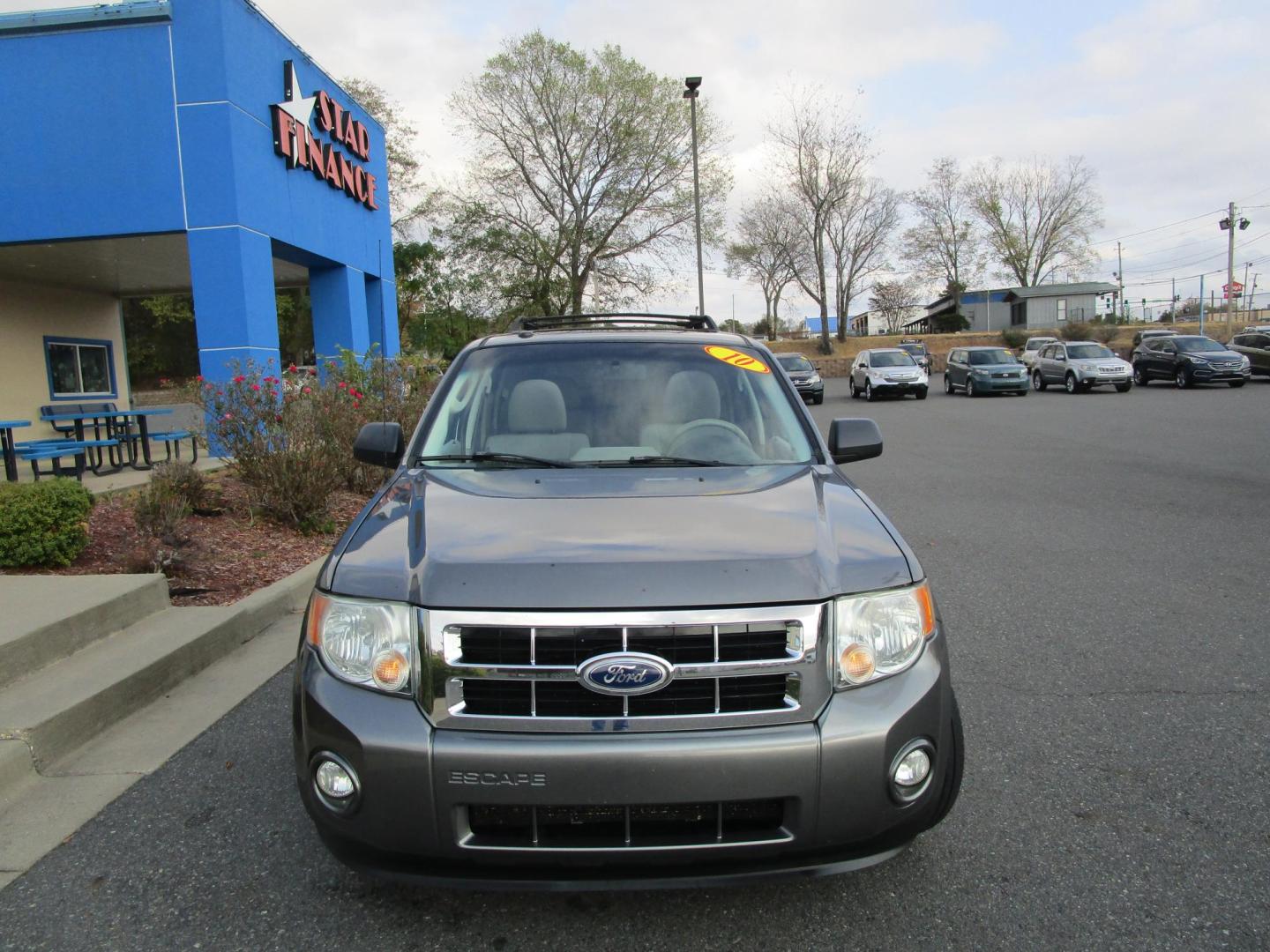 2010 Grey /Gray / Cloth Ford Escape XLT 4WD (1FMCU9D71AK) with an 2.5L L4 DOHC 16V engine, 6-Speed Automatic transmission, located at 1814 Albert Pike Road, Hot Springs, AR, 71913, (501) 623-1717, 34.494228, -93.094070 - This 2010 Ford Escape XLT, has low miles and gets great gas mileage. 103" wheelbase, 6 speed automatic transmission. Exterior Features Include: Chrome grille. Easy fuel capless filler. Fog lamps. Manual fold power windows. Blind spot mirrors. Roof rack with side rails. Interior Features Incl - Photo#1