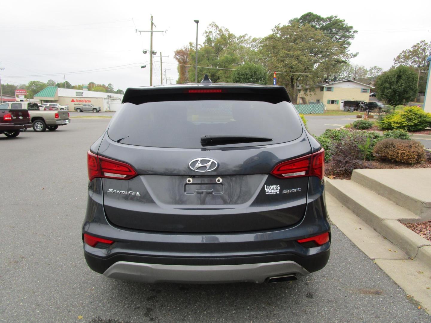 2017 Grey Hyundai Santa Fe Sport 2.4 FWD (5XYZT3LB3HG) with an 2.4L L4 DOHC 16V engine, 6A transmission, located at 1814 Albert Pike Road, Hot Springs, AR, 71913, (501) 623-1717, 34.494228, -93.094070 - 2017 Hyundai Santa Fe Sport 2.4L I4 F DOHC 1 16V Gasoline Front Wheel Drive - Photo#3