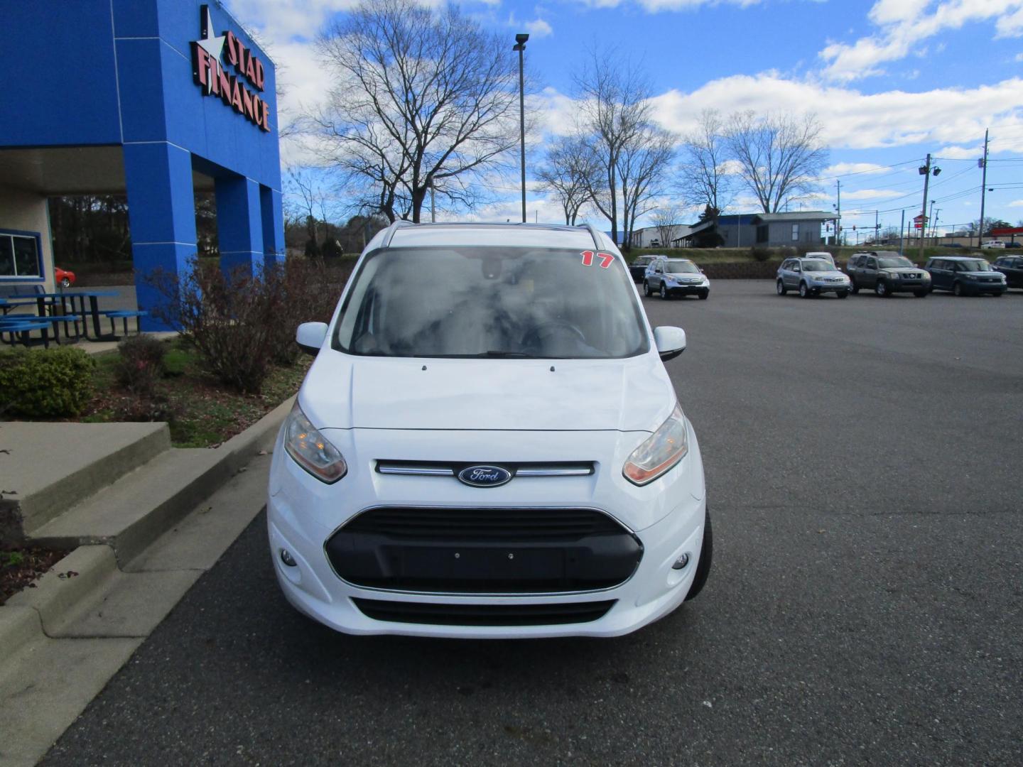 2017 WHITE /Stone Ford Transit Connect Wagon Titanium w/Rear Liftgate LWB (NM0GE9G71H1) with an 2.5L L4 DOHC 16V engine, 6A transmission, located at 1814 Albert Pike Road, Hot Springs, AR, 71913, (501) 623-1717, 34.494228, -93.094070 - 2017 Ford Transit Connect Titanium 7 Passenger 2.5L DOHC Engine 6 Speed Automatic Transaxle W O/D. Exterior Features: Auto Halogen Headlamps. Dual Sliding Side Doors. Liftgate with Fixed Glass. Fog Lamps. Integrated Spotter Mirrors. Power Adjust/Heated/Fold Exterior Mirrors. Rain Sensing Wipers - Photo#1