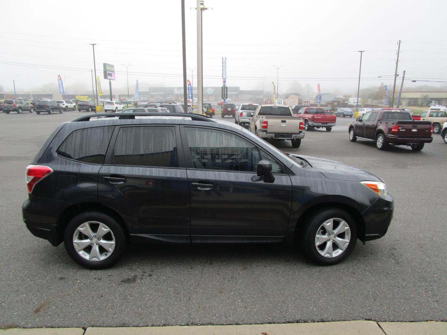 2015 CHARCOAL Subaru Forester 2.5i Premium (JF2SJABCXFH) with an 2.5L H4 SOHC 16V engine, 6-Speed Automatic transmission, located at 1814 Albert Pike Road, Hot Springs, AR, 71913, (501) 623-1717, 34.494228, -93.094070 - Photo#2