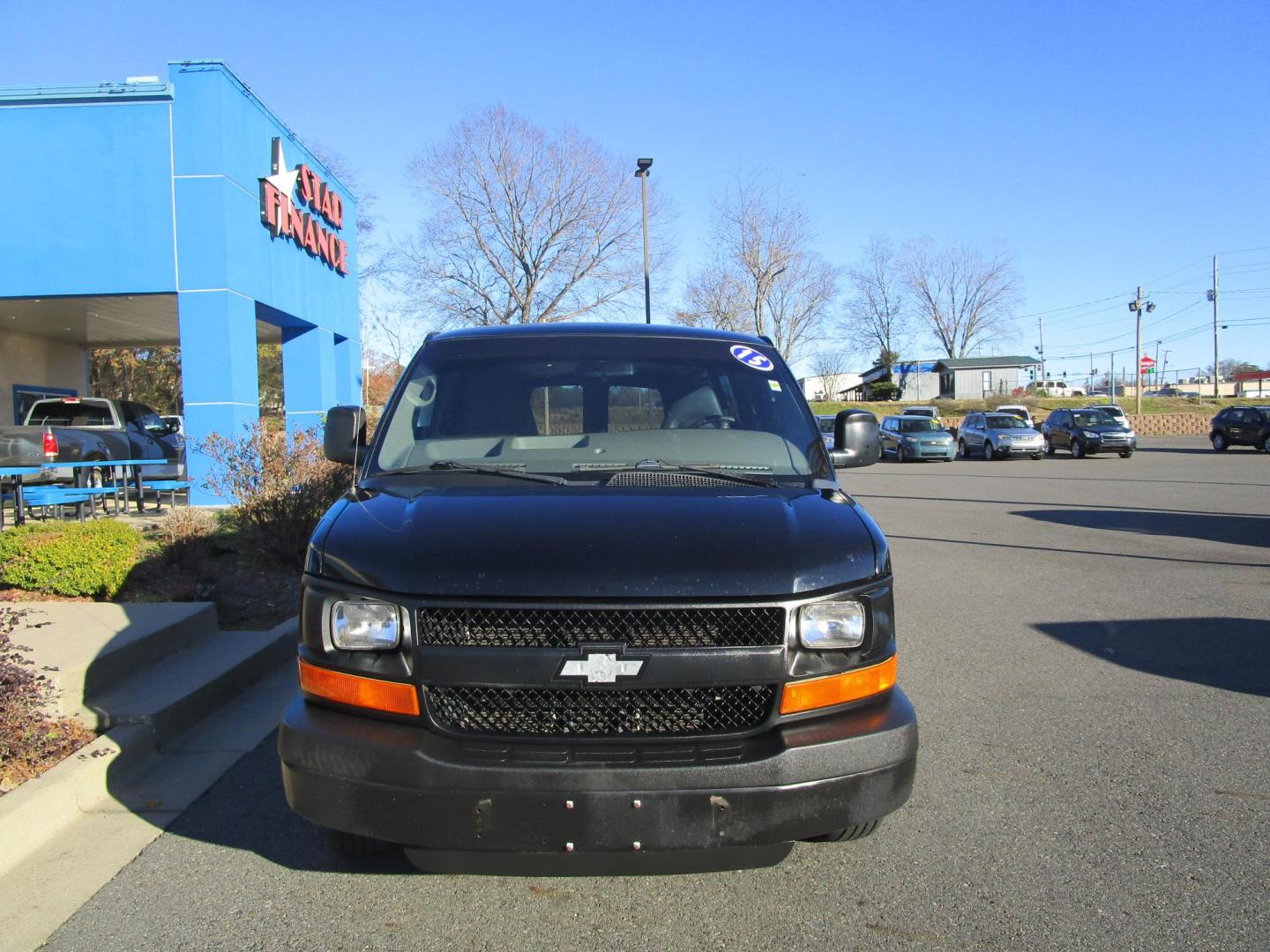 2015 BLACK Chevrolet Express LS 3500 Extended (1GBZGZFG8F1) with an 6.0L V8 OHV 16V FFV engine, 6A transmission, located at 1814 Albert Pike Road, Hot Springs, AR, 71913, (501) 623-1717, 34.494228, -93.094070 - Photo#1